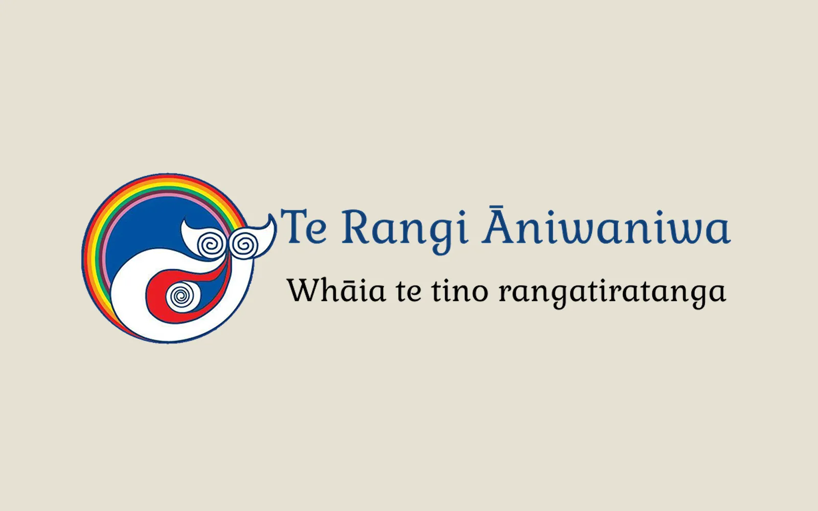 The Te Rangi Āniwaniwa kura logo — a koru circle ringed in rainbow colours, beside the words Te Rangi Āniwaniwa and Whāia te tino rangatiratanga